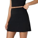 Amazon Essentials Damen Active FormFlex Buttery Soft Tennisrock mit integrierter Shorts und Taschen, Schwarz, L