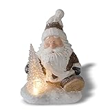 NATIV Weihnachtsdeko Weihnachtsmann mit LED beleuchtetem Tannenbaum| Weihnachtsschmuck aus Magnesia | Weihnachtsfigur 37 cm hoch | Tolle Geschenkidee zu Weihnachten