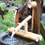Japanischer Zen-Gartenbrunnen mit Bambus-Wasserspiel und Schaukelpumpe Ruhige Wasserlandschaft für japanische Gartendekoration