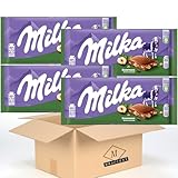 Milka Haselnuss 4 x 100g I Alpenmilch-Schokolade I mit Haselnuss-Stückchen I Milka Nuss-Schokolade aus 100% Alpenmilch I Tafelschokolade (400g) + MBAccent Versandschutzpackung